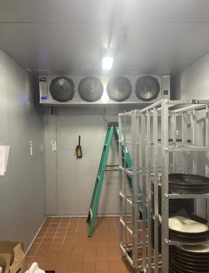 Walk-in cooler with a four-fan evaporator serviced by J and G Refrigeration in Rockford, IL